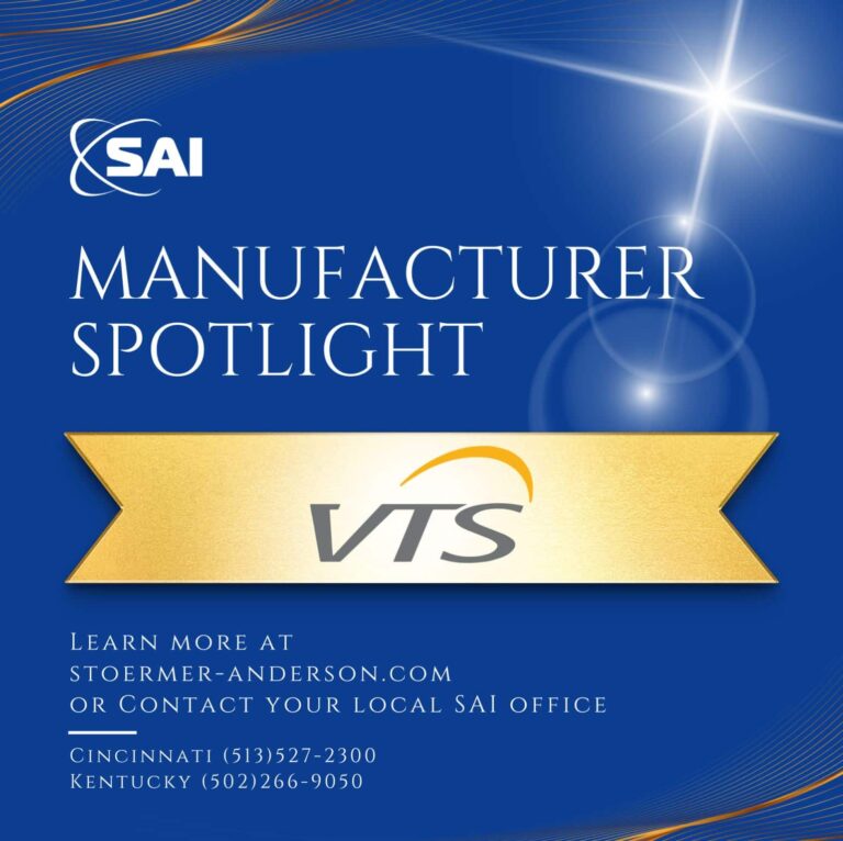 A promotional graphic featuring the SAI logo in the top left corner against a blue background. The text 'Manufacturer Spotlight' is prominently displayed in white. Below, a gold ribbon with 'VTS' logo is centered. Contact information for Stoermer-Anderson is provided, including a website link and phone numbers for Cincinnati and Kentucky offices. Decorative elements include a starburst effect and flowing lines.