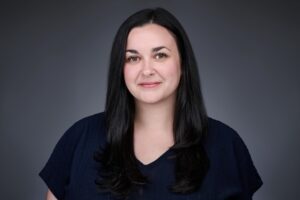 Smiling woman in dark shirt